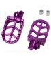 JUEGO REPOSAPIES ALU CNC CARENZI RIEJU MRT 50CC ( INCLUYE MUELLE Y EJE D : 8MM) LILA R: 360035K